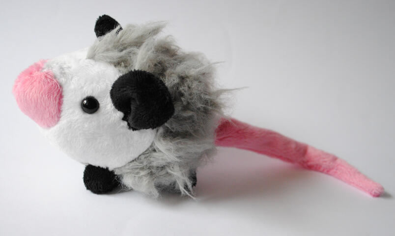 Possum plushie made from my own pattern, featuring hand and machine sewn elements.