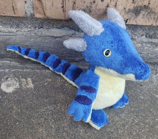 Custom plush made with my own pattern. Hand and machine sewn.