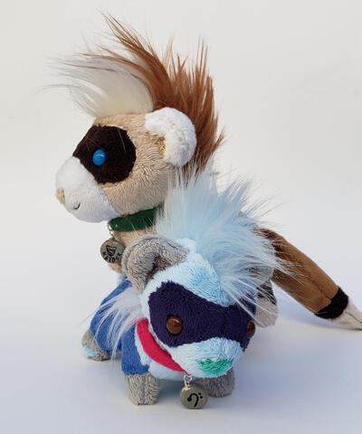 Custom plush made with my own pattern. Hand and machine sewn, with painted polymer clay collar elements.
